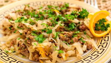 Рецепт Капусты, тушенной с фаршем и апельсинами