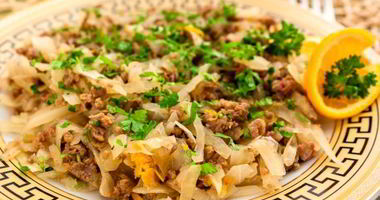 Рецепт Капусты, тушенной с фаршем и апельсинами