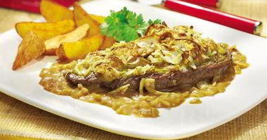 Рецепт Запеченного шницеля в сливочно-луковом соусе