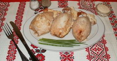 Рецепт Фаршированного кальмара с рисом и яйцом